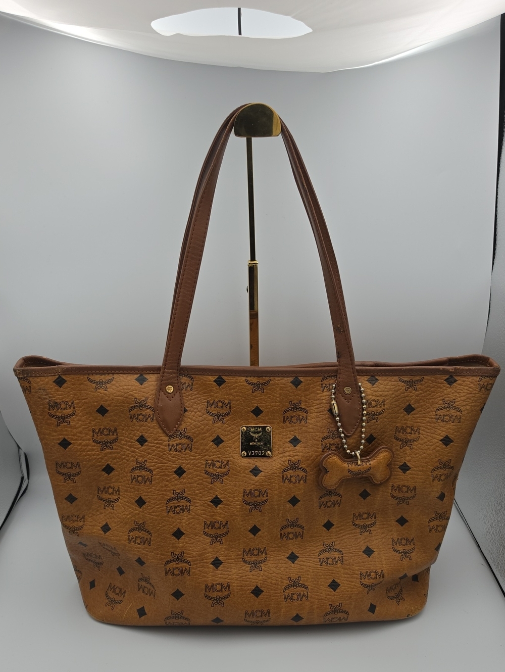 MCM Cognac Logo Monogram Brownish Orange Large Tote W/ Dog Bone (GOOD)COA✨️🤎✨️